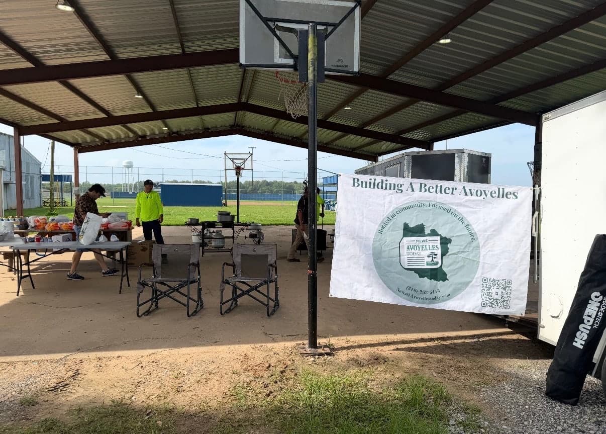 Building a Better Avoyelles banner at an outdoor service event